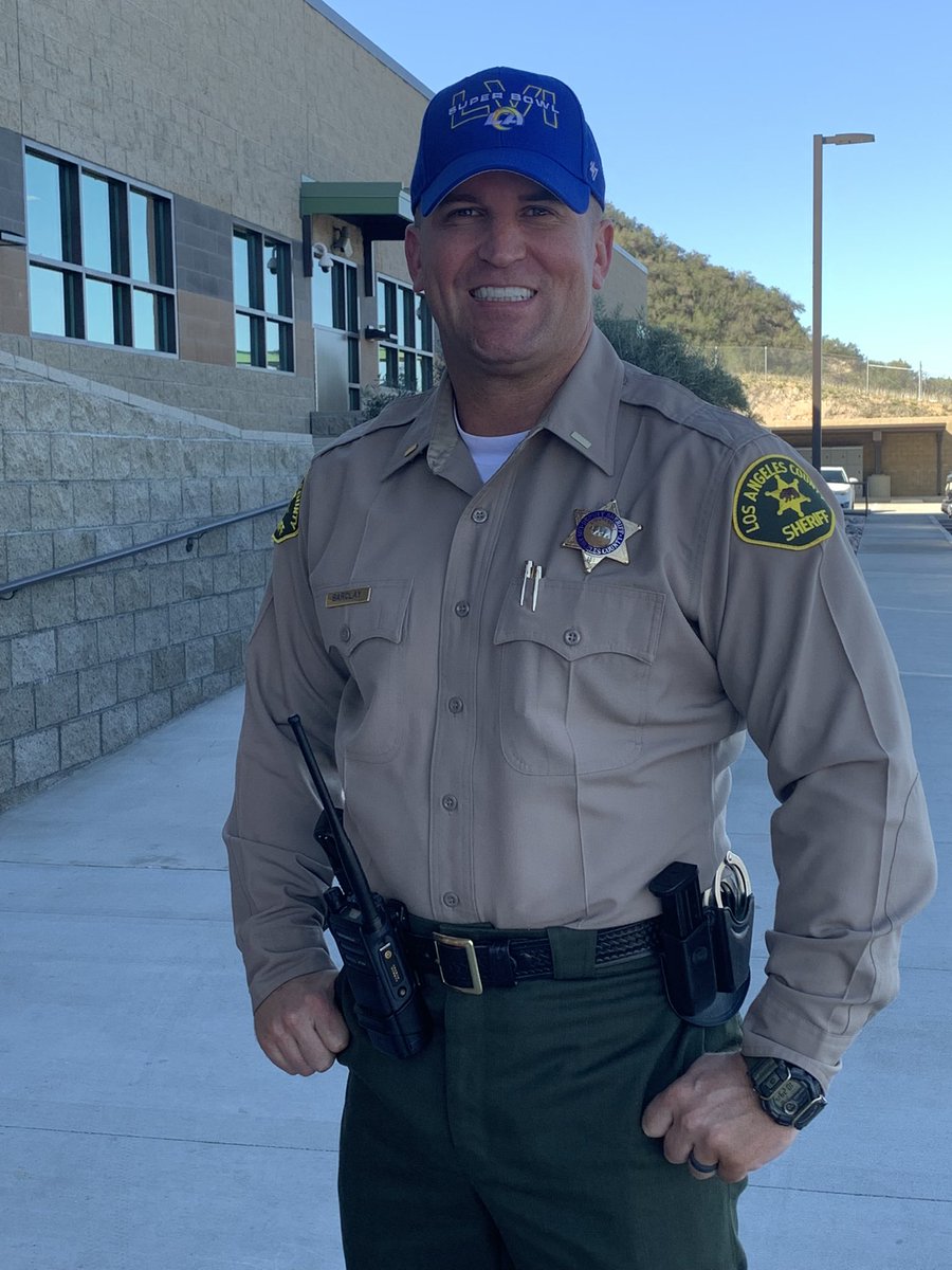 SCVSHERIFF's tweet image. Sheriff Alex Villanueva has temporarily authorized LASD personnel to wear Rams caps until the end of Super Bowl LVI. Lieutenant Barclay is ready to show support. Go @RamsNFL!

#SuperBowlLVI #RAMS #TheBearGoesEverywhere