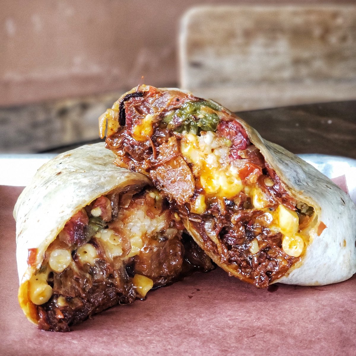 Burrito! Todays beastwich is chopped brisket, mac &amp; cheese, potatoes, and smoked onions, tomatoes &amp; jalapeños in a flour tortilla.