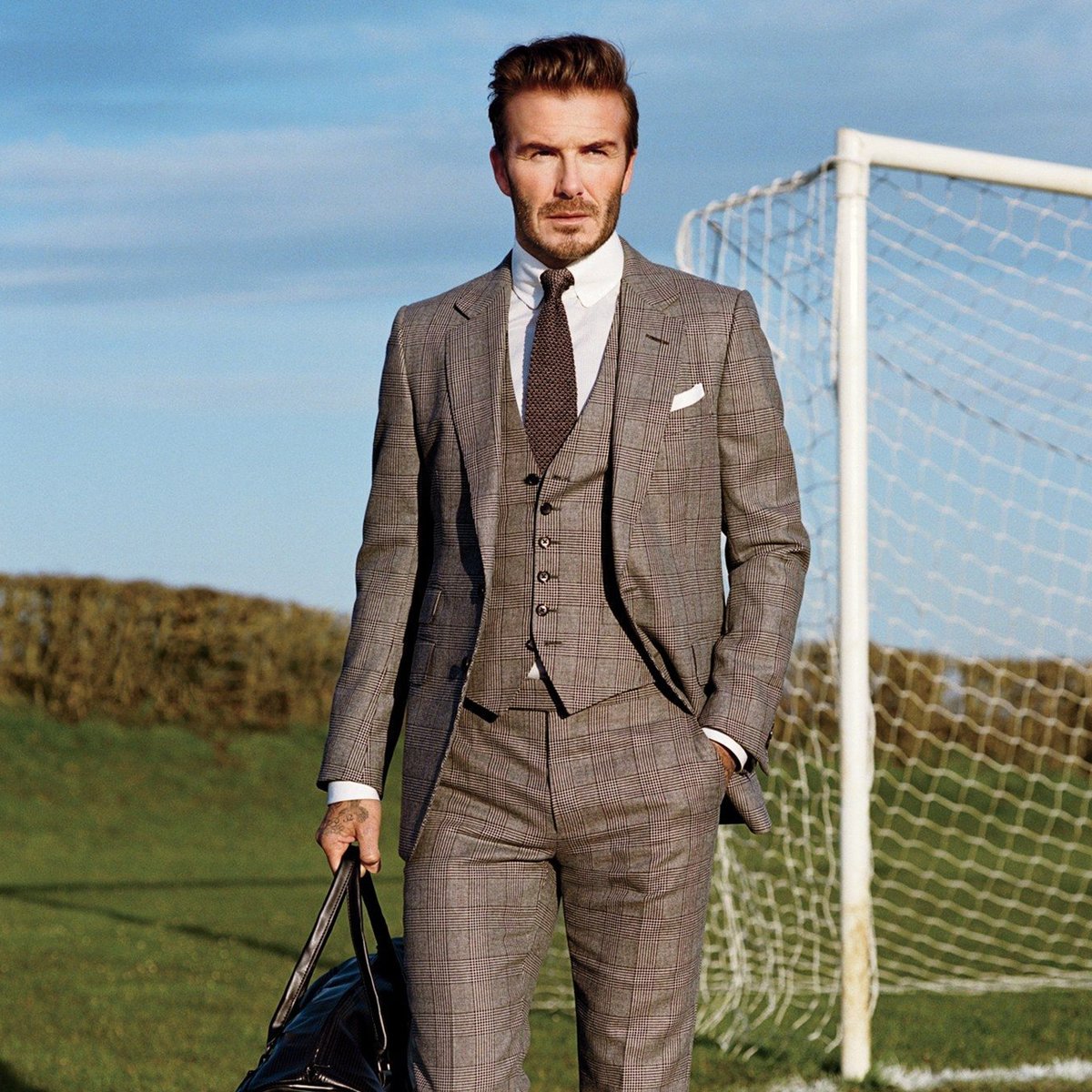 suitsnbootz's tweet photo. David Beckham is one celebrity who symbolizes elegance and class. His fashion sense is so on point like his on-field game. Dress up in a three-piece suit like Beckham and look an epitome of elegance.

#suitsandboots #Beready #fancysuit #mensfashion #fashion #dapper #dope #suits https://t.co/UcTyFzTXhE