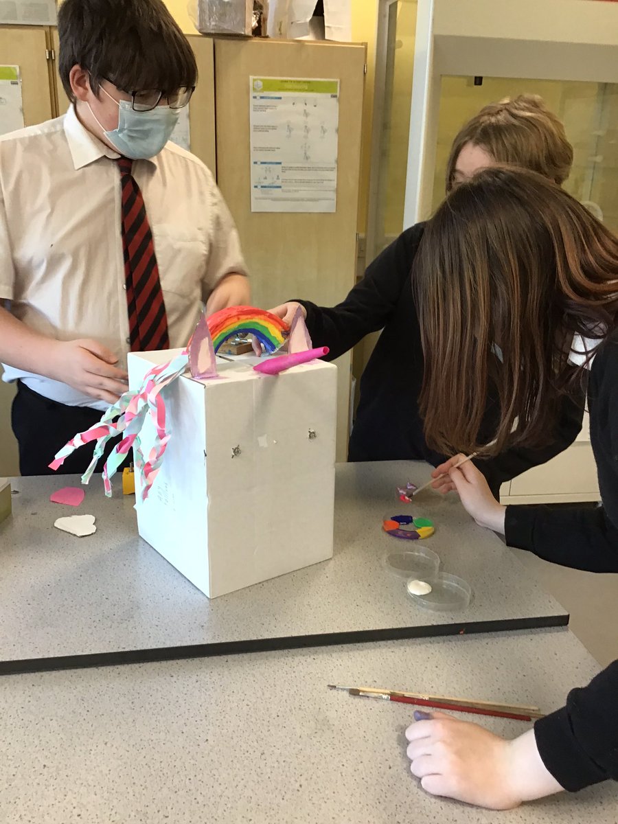 addie_jen's tweet image. @Sci_BHS My S2 Scientists have had a great week planning and building their Robot Heads. The checklist of features include winking eyes, a spinning nose and a plan of their circuits. I’m loving the light up unicorn horn. One group is even making a Mrs Addie robot head! #STEM