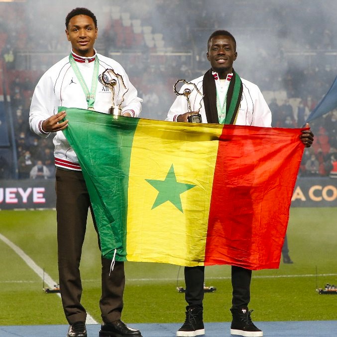 PSG_English's tweet photo. 🏆🇸🇳✨ @IGanaGueye &amp; @Abdou_diallo_ 

Our CHAMPIONS! ❤️💙 https://t.co/ZdnCS77YGy