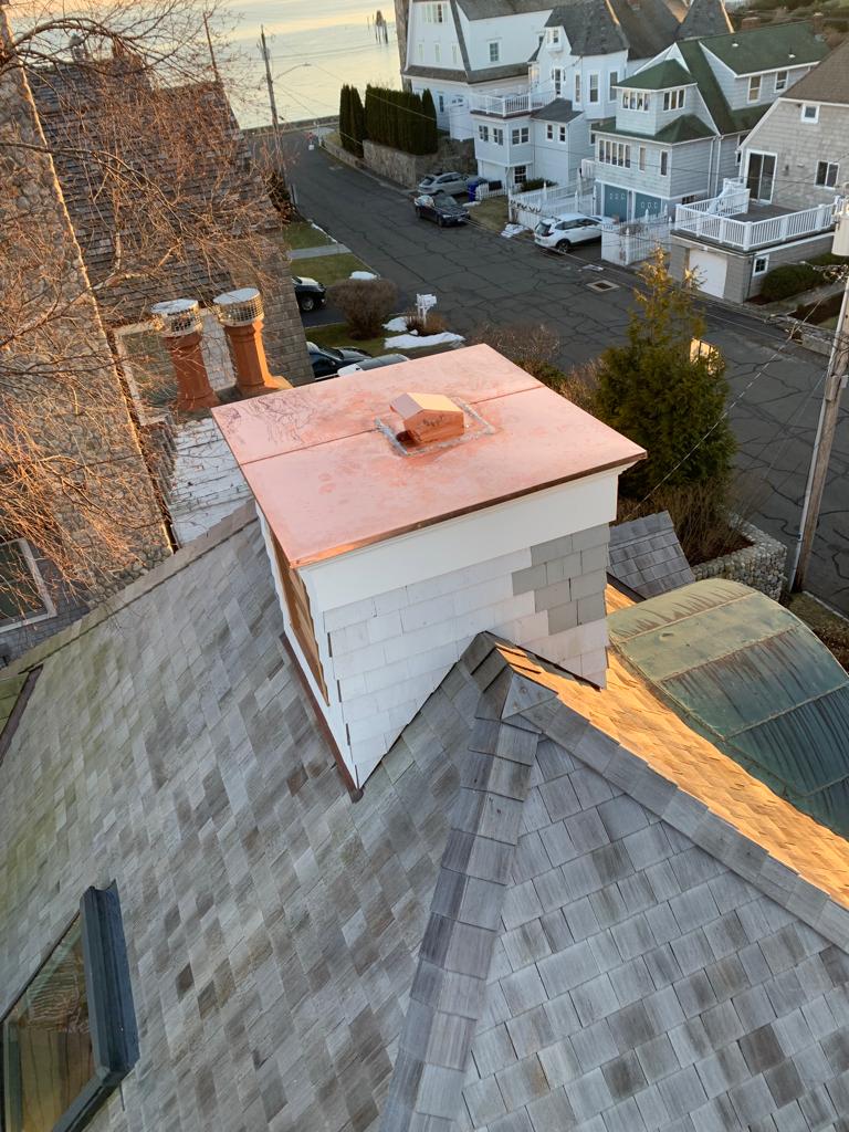 Bringing you a birds eye view from this Rowayton home's roof where you can see both the new cupola, which is an architectural element to crown a large roof, & the Long Island Sound! #burrrsw #cupola #copperflashing #roofing #longislandsound #rowaytonct #ctlocal #ctlocalbusiness