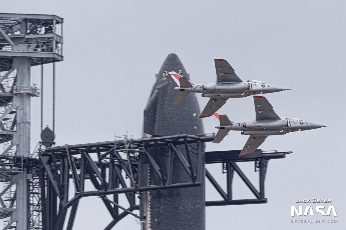 thejackbeyer's tweet image. Two Alpha Jets flying past the full Starship stack. It never ceases to amaze me the things you can see in Starbase when you are at the right place at the right time. @NASASpaceflight
