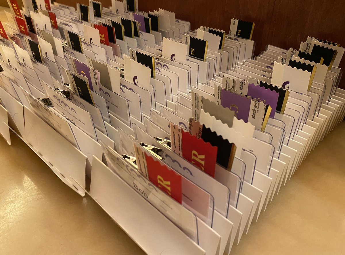 Registration desk pet peeve: staff having to turn their back to the person checking in. Challenged by reg desk setups, quantity of badges, and finding something inexpensive and small enough to ship repeatedly in as little extra space as possible… enter <a href="/pcnametag/">pc/nametag</a>