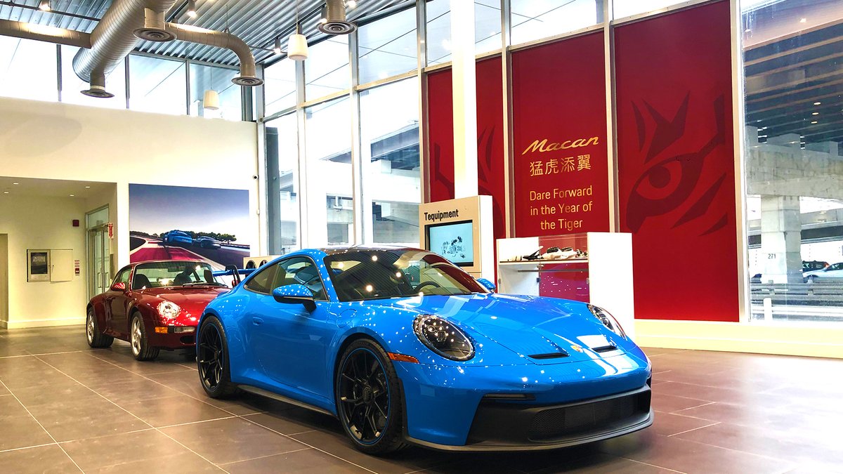 torontoporsche's tweet photo. The Porsche 911 is a timeless machine. Although this pair of 911s inside our showroom are exactly 26 years apart, the essence, shape and soul of the original 911 can be seen in them throughout. #pcdt #porschedowntowntoronto #porsche911 #toronto #911gt3 https://t.co/1o4KNtXN7J