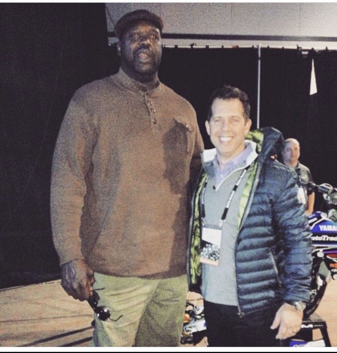 julioidesign's tweet photo. @AdamSinger @TrungTPhan That one time I meet @SHAQ and he had a bbq stained on his shirt… oh no wait, it’s the shadow of my head!! https://t.co/fThUQ8q0a4