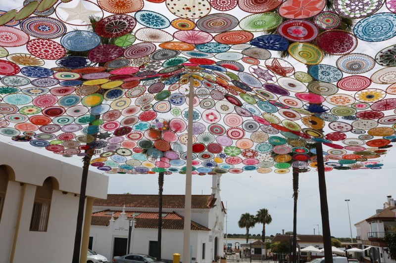 womensart1's tweet photo. Crocheted canopy created by 40 local women, Cartaya, Spain #WomensArt https://t.co/NKly8RgdlT