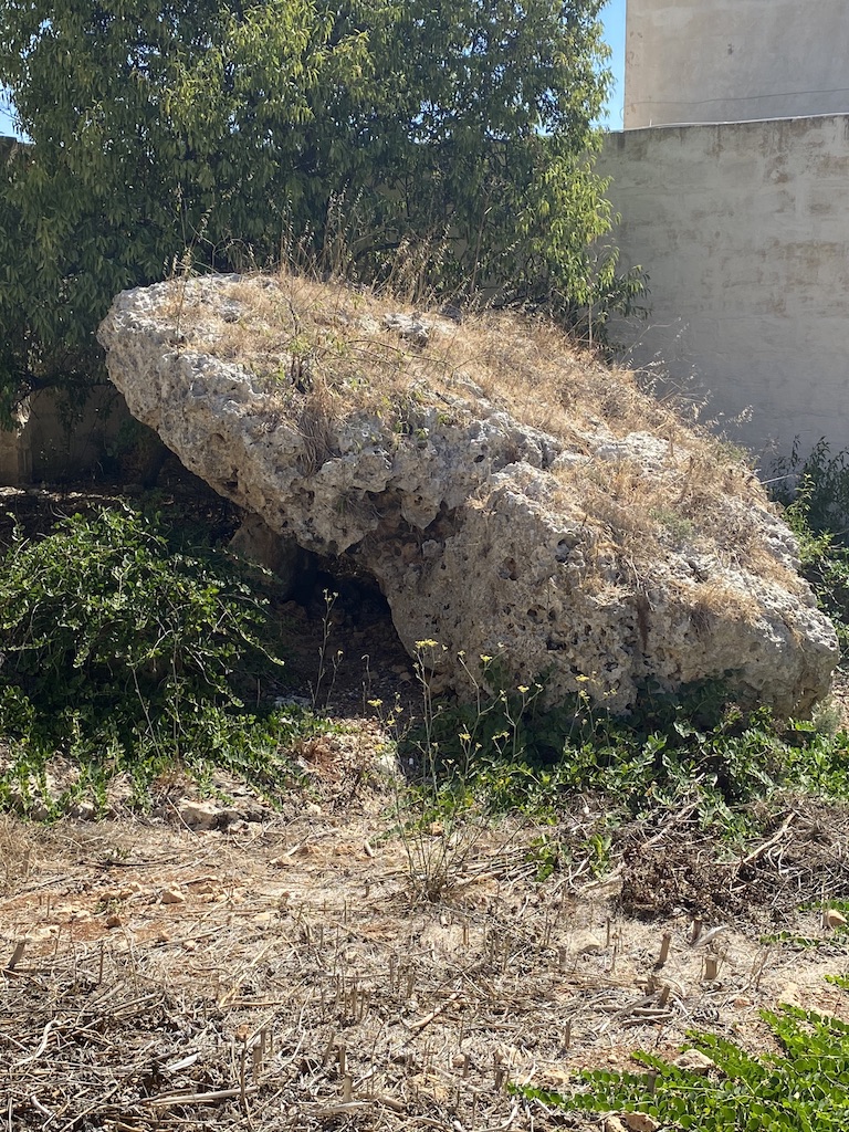 Four accessible Maltese dolmens. They have been dated to the Bronze Age but no sherds or burials were found in them. Dating is based on pottery from the Ta' Ħammut dolmens which aren't pictured here.