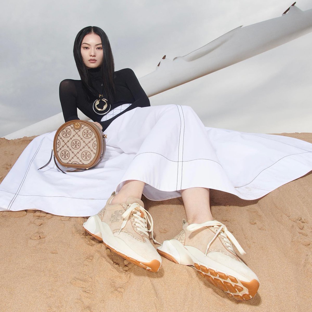 toryburch's tweet photo. The #GoodLuckTrainer. A flattering deep ankle scoop, oversized ergonomic sole and our signature #TMonogram pattern.
#ToryBurchSS22 #ToryBurch https://t.co/6YLcoymF2s https://t.co/v0VRYWvdok