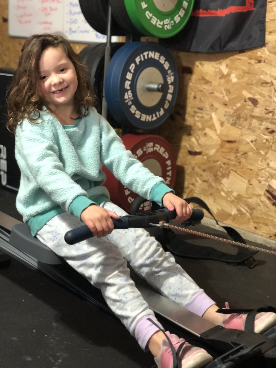 CoachSutor's tweet photo. Someone just wanted to hang out with Daddy in the garage gym this morning. ❤️

And then she wanted to row. 😳

#DaddyWin #Holly https://t.co/NhuqsbCiRL