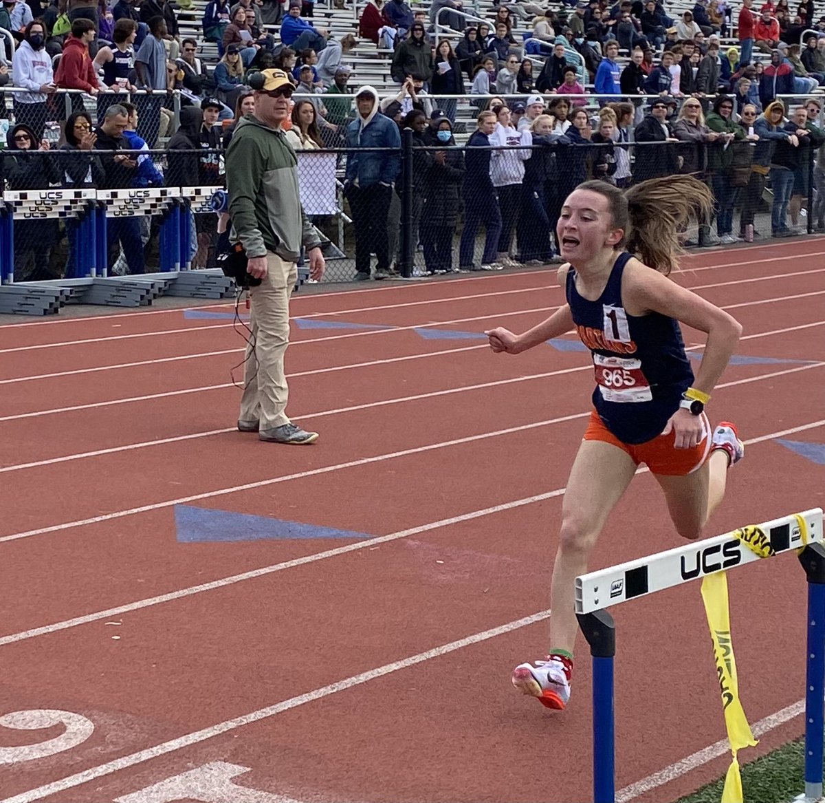 Aiden MacGrath wins the mile in a personal best time