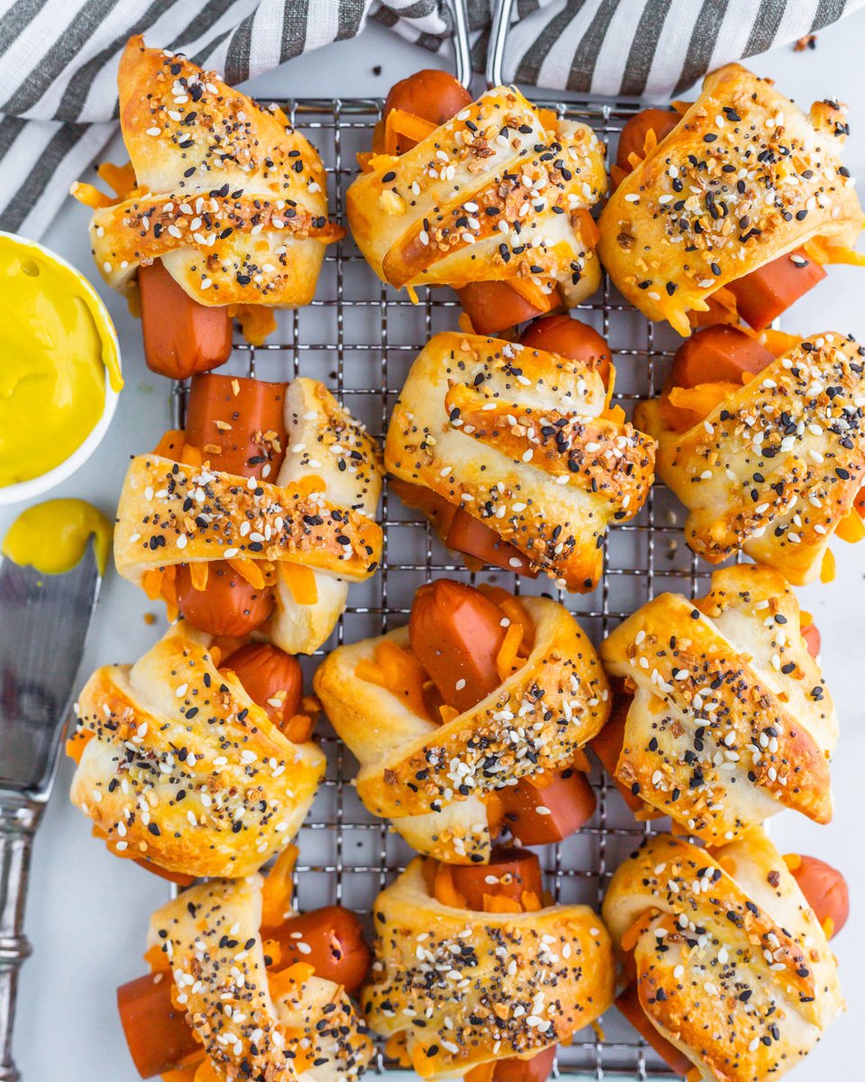 Ready for your vegan snacks this coming game day? These Cheesy “Everything Bagel” Dogs by @vegantraveleats are a must for #SuperBowlSunday! 🏈  Vegan hotdogs wrapped in cheesy crescent dough and topped with everything bagel seasoning. 🤤 bit.ly/3HnHfQE #veganrecipes