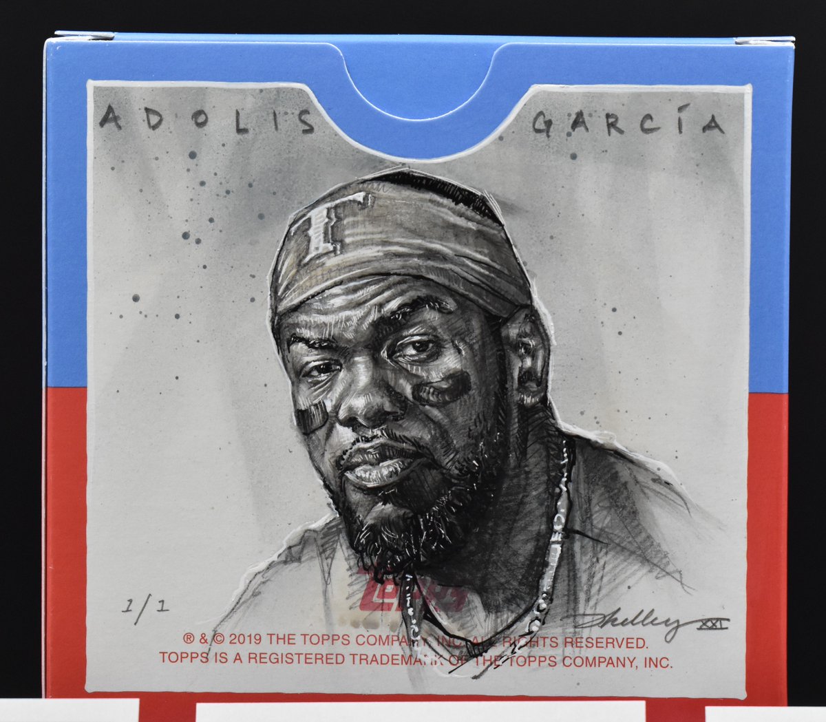 wheelercollect1's tweet photo. Don't miss out on your chance at this 1-of-1 art box of Adolis Garcia by artist Jared Kelley.  @jaredkelley @AdolisGarciaSZN https://t.co/PuqKf12b8w
