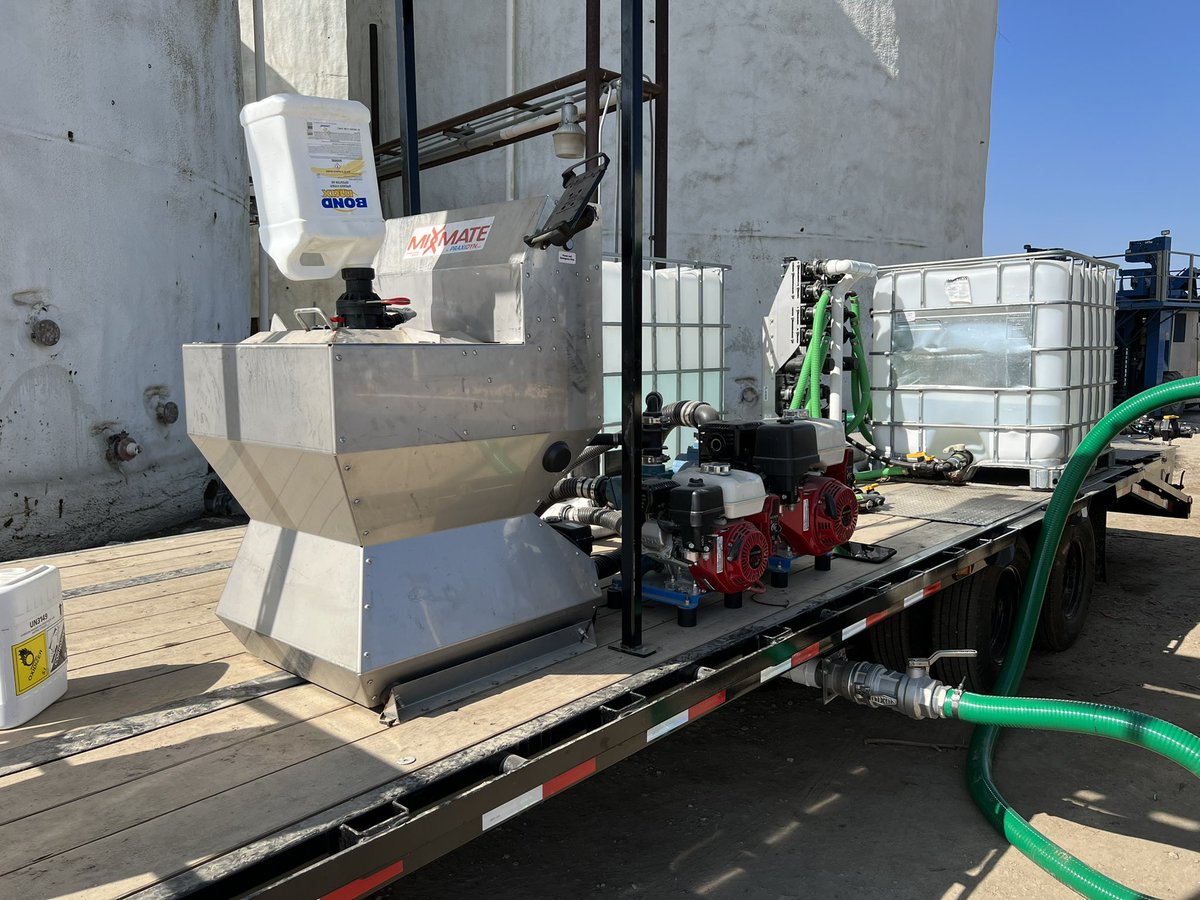 Praxidyn's tweet photo. This Mixmate system has been modified with a closed jug system for California. Automated mixing and recordkeeping for six bulk products, dry products and jugs. Supporting air blast sprayers in pistachios, almonds, and blueberries. #mixmate https://t.co/1RxtKiYES4