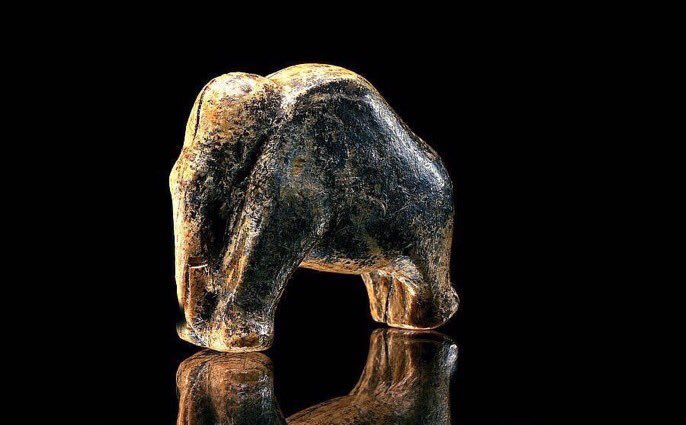 Against all odds, this tiny mammoth survived the ice age. Carved in woolly mammoth ivory using flint tools 35,000 years ago, it was discovered in 2007 in the post-excavation spoil at Vogelherd Cave 70 years after the original archaeological excavations! Image: Tübingen Museum.