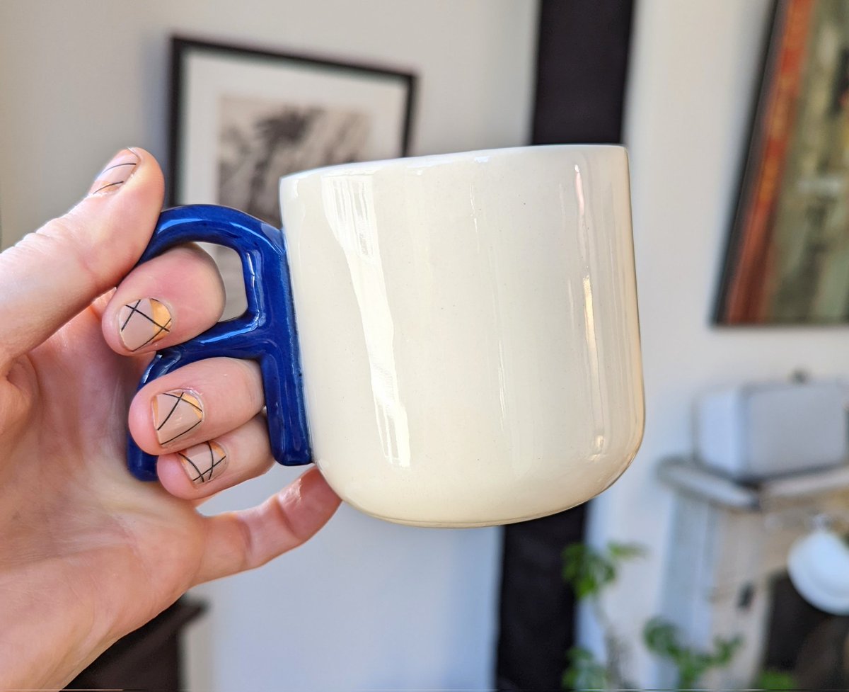 Final prototype of the #rstats mug is here! I need to remake the mold (to prevent the top from looking wobbly) and make a larger size option, but then hopefully I'll be ready for "production" (as in very small batches). This will still be months away, but still: 🎉