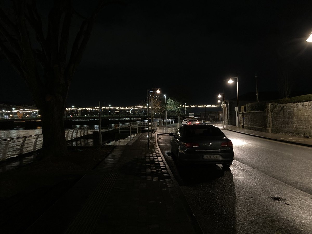 meanderingtripe's tweet photo. I see the string lights are gone from Limerick’s O’Callaghan Strand.

I can only hope that it’s a temporary removal due to tree-pruning, as it’s dark as fuck down there now, the permanent lights being about as useful as a cat flap in an elephant house. https://t.co/hSceOjZ0qy