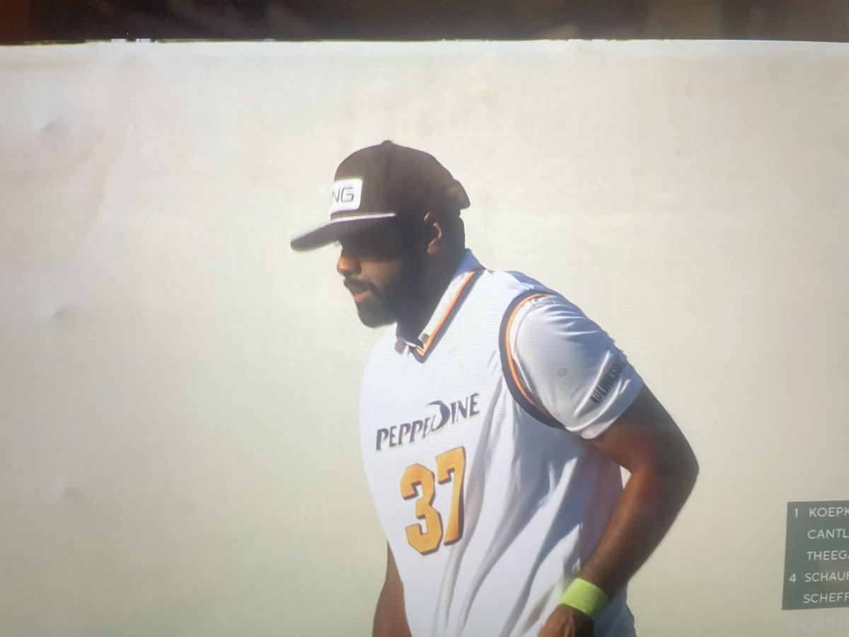 Look at <a href="/SRTheegala/">Sahith Reddy Theegala</a> in the <a href="/pepperdine/">Pepperdine University</a> jersey on the 16th hole at the <a href="/WMPhoenixOpen/">WM Phoenix Open</a>! He’s still tied for first place!

#WavesUp | <a href="/PeppAlum/">Pepperdine Alumni</a>