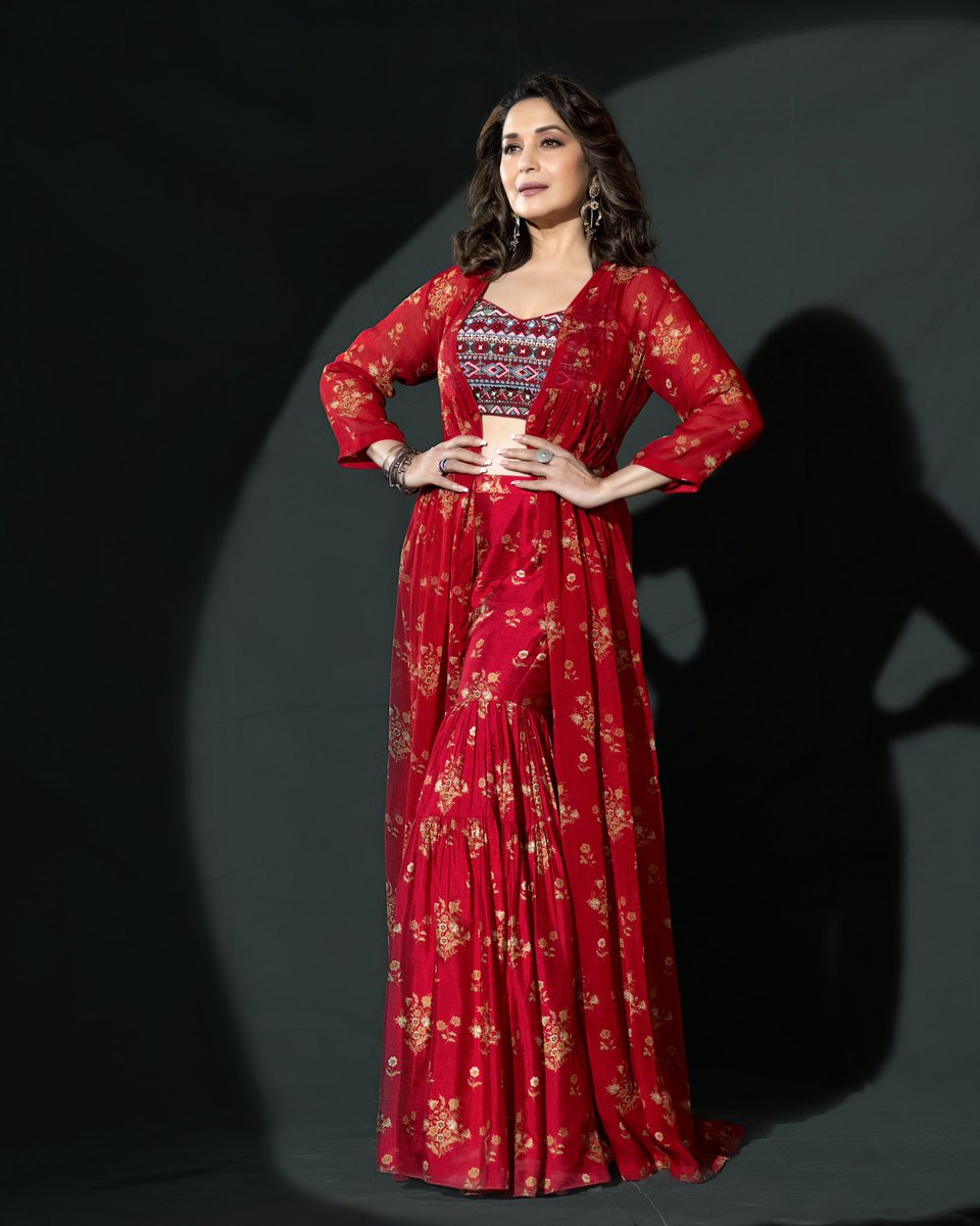 MadhuriDixit's tweet photo. Two things in the world are not meant to be hidden - love and your red dress. 

#TheFameGame #RedOutfit #SundayVibes https://t.co/BrA2ZUv8PY