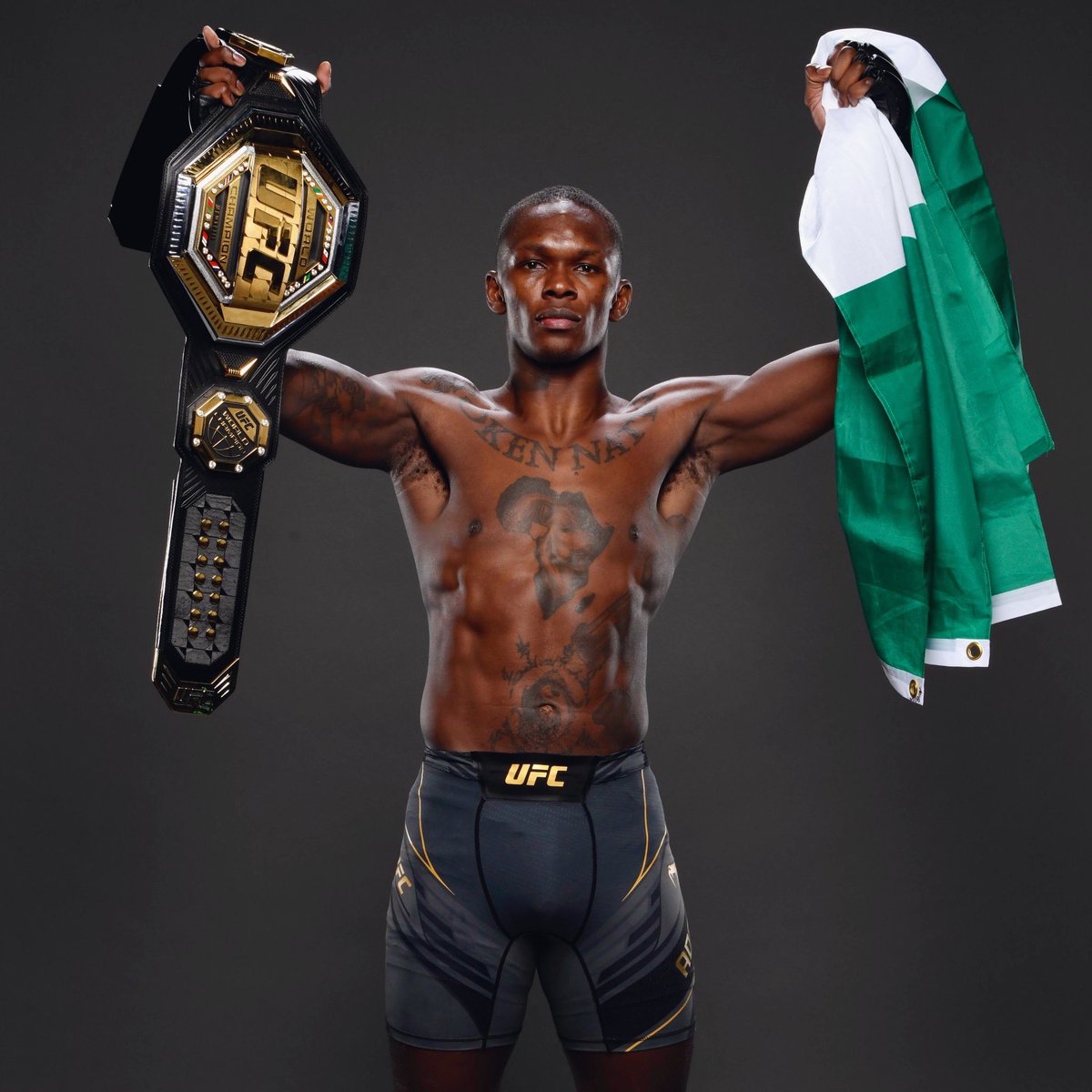 PulseNigeria247's tweet photo. PHOTOS: Israel Adesanya retains UFC middleweight title after a win against Robert Whittaker. https://t.co/JmOkuh0BZo