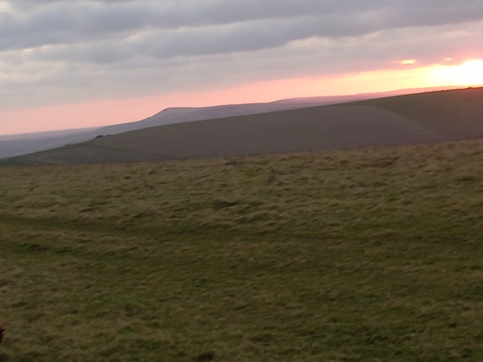12 Feb. Ride from Falmer to a very windy Firle Beacon & back. 23 miles. Great ride. Ground drying out at last. 🚴‍♂️ Photo : distant Firle Beacon at Sunrise. #SouthDowns