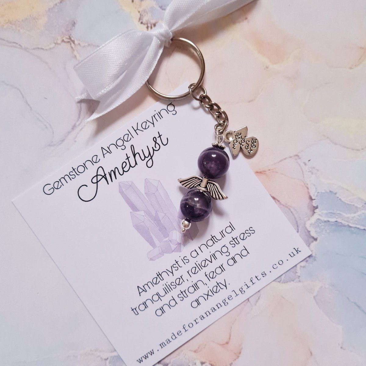 Amethyst Signature Angel Keyring. Keeps you safe and helps to relieve stress and anxiety. madeforanangelgifts.co.uk #amethyst #Angel #angelkeyring #signaturekeyring #designerangel #amethystangel #anxiety #anxietyLife