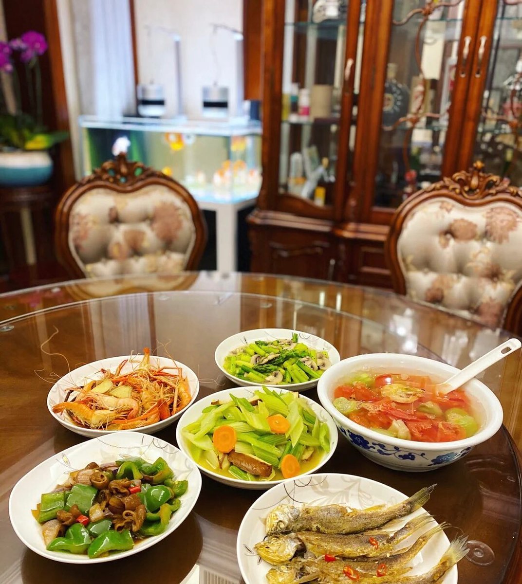 A table of delicious food is bursting with happiness