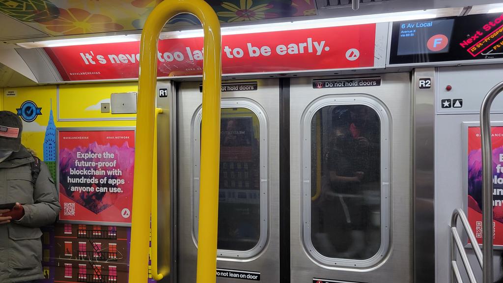 garrygolden's tweet photo. My son noticed this blockchain ad on subway. Yes I think the time has come for the three Cardano founding entities to spend real world money on real world global brand marketing. They have billions... spend some on brand recognition mindshare. https://t.co/dFZmJvcGNe