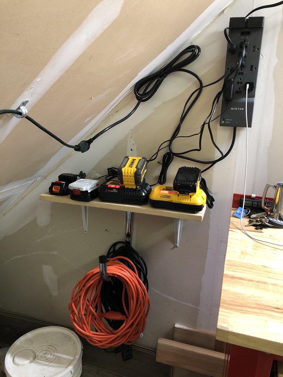 Doing my best to pass along the skills my dad taught me. New garage power tool battery charging shelf #DadLife

[Image descriptions: 3 pictures of a young boy sawing a piece of wood, hammering an anchor into a wall, &amp; tightening a screw. 4th picture is the finished shelf]