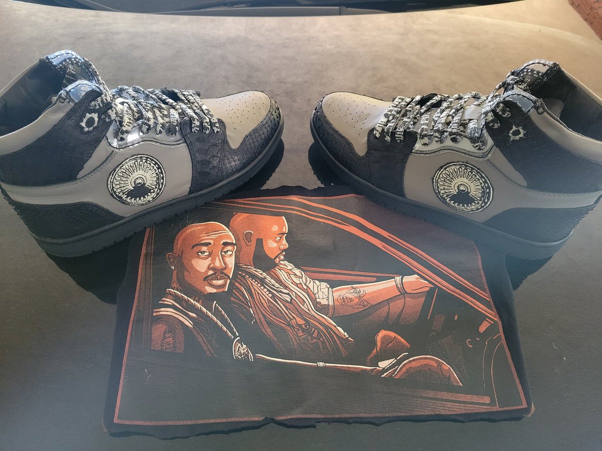 gibby1996's tweet photo. #NFTCommunity #shoesaddict 
#Sneakers #SneakerScouts 
#shoelove #design #2pac 
#hiphop #hiphopculture 
I designed these shoes dedicated to 
"The last" moments in Vegas. These shoes represent the BMW with plexiglass,therims,the rims, yes even 40 glock bullet holes. https://t.co/l5dukfX3es