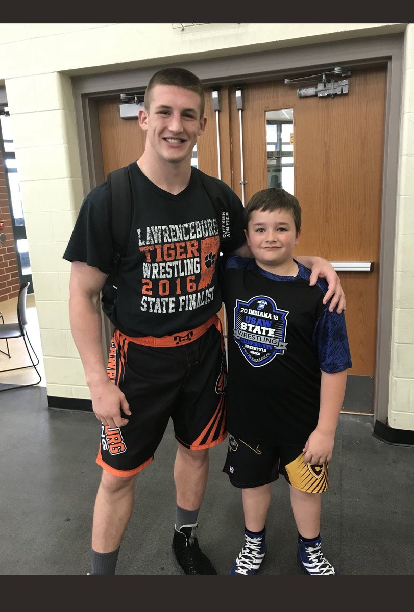 jhewig12's tweet photo. Lane got to see his fav college wrestler this weekend.  Thanks @Parris58 for making this kids night. https://t.co/hlqMJuEa1f
