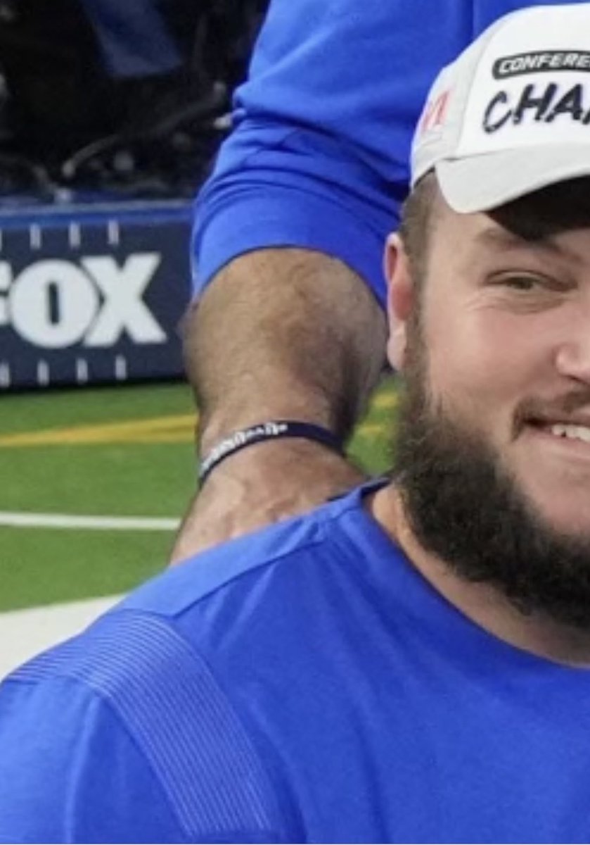 BabeLaufenberg's tweet photo. As if Mathew Stafford isn’t enough reason to pull for the Rams, that is Rams O-Line coach Kevin Carberry top left. And yes, wears the #LiveLikeLuke wrist band. ⁦@wadied11⁩ https://t.co/htqby0AwNO