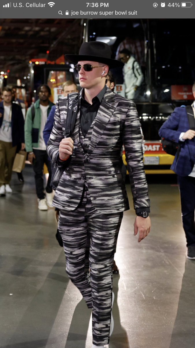 JoziGrobe's tweet photo. Tell me why Joe Burrow’s super bowl outfit looks like he is about to rob Ronald McDonald as the Hamburglar https://t.co/9Bz501Xud8