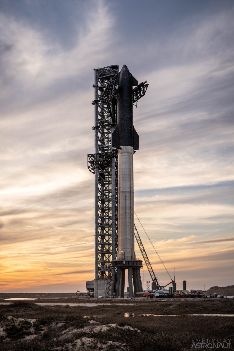 Erdayastronaut's tweet photo. It’s hard to explain what it’s like to be on a beach in Texas &amp; see the world’s largest rocket just standing there. And to watch the sun set behind it. Breathtaking doesn’t do it justice nor awe inspiring. Uncontrollable sense of pride and excitement, almost a hysteria of sorts. https://t.co/LYrLx5syzI
