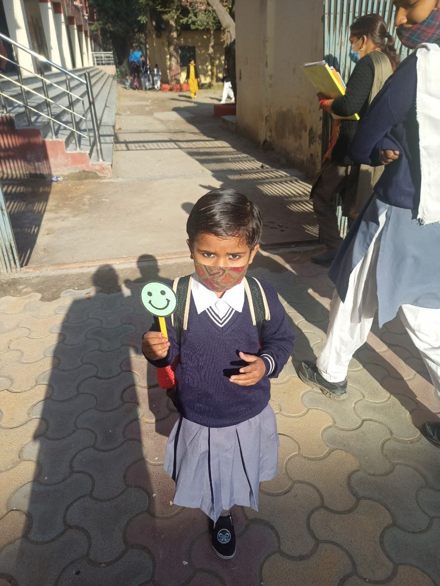 1925040School's tweet photo. Primary class student with happy face after reopening of school for #PrimaryClasses. https://t.co/0gIyxbVMRs