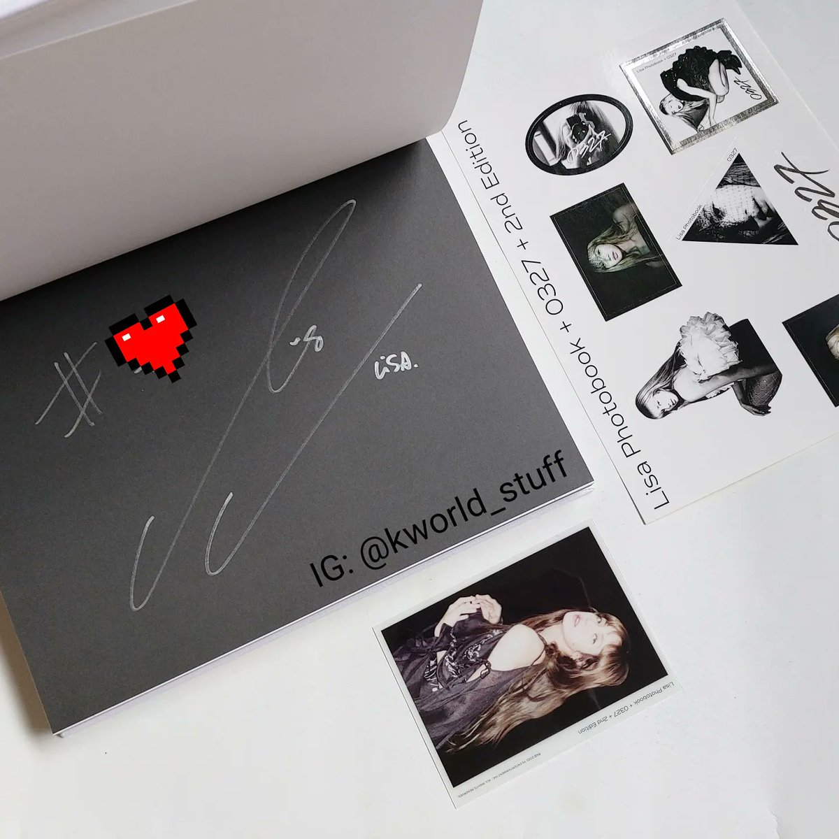 KworldStuff's tweet photo. WTS: BLACKPINK LISA Signed 0327 Photobook Vol. 2

Rare!
Official &amp; authentic.
In excellent condition. 
Only 327 copies are signed version, this is one of them!
Signed by Lisa herself.
With an unique number written by her.

USD$580.
Including TRACKED shipping.
DM me if interested! https://t.co/ucNPmk8IiM