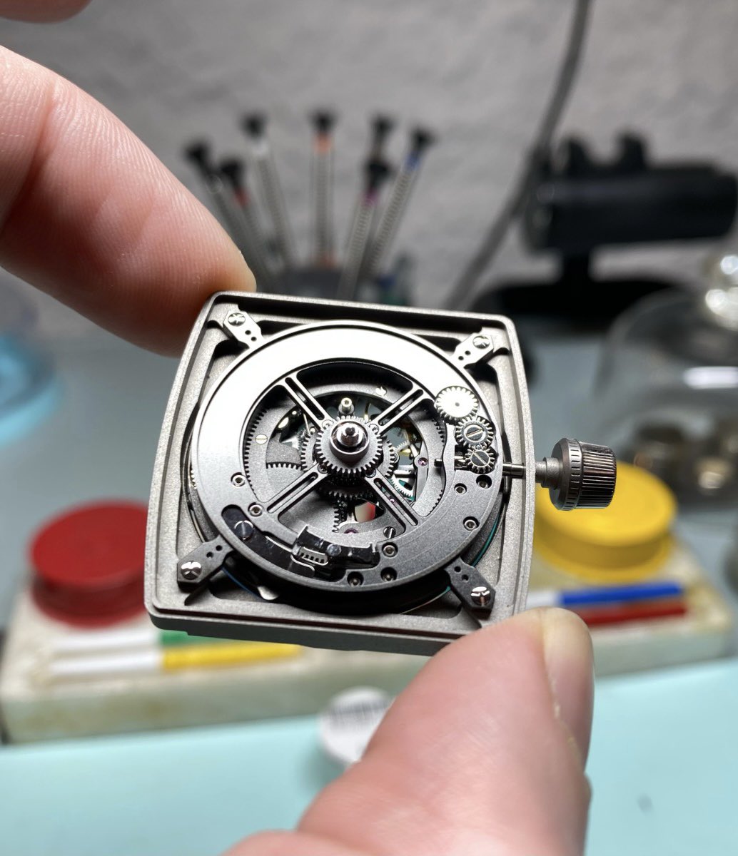 VAULTswiss's tweet photo. @jenniwatch working hard on project ONYX 🤩 the bespoke movement and HGT transmission are now thoroughly tested in a test case for the upcoming days #vaultswiss #bespoke #watch https://t.co/b02pwRx5KP