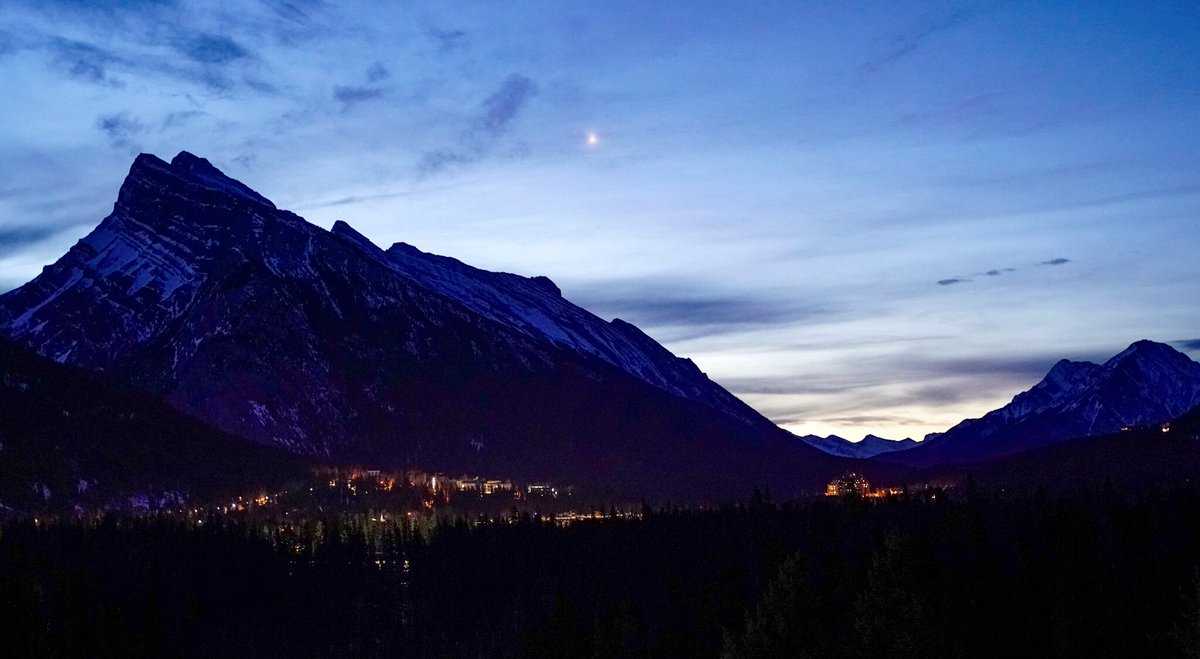 Venus shines down on the town of Banff early this Valentine’s Day morning. Photo by <a href="/Graydio1/">David Gray</a> #ValentinesDay2022  #canada #travel #supportlocal