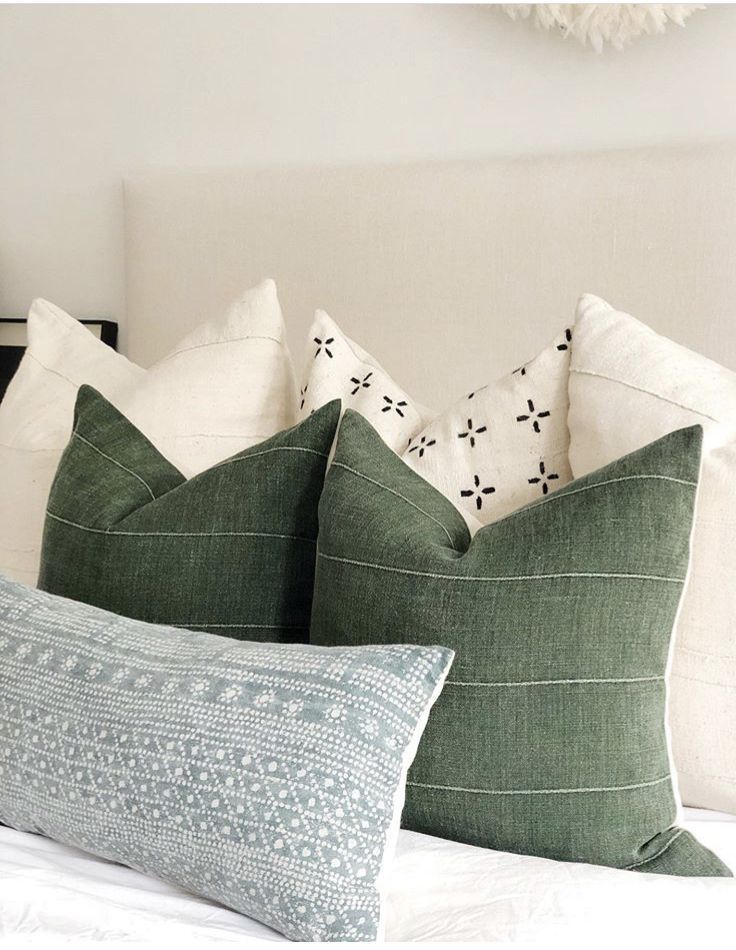 The comfiest beds have the most pillows. Break up the look of your bed by mixing pillows with different patterns, textures, and colours. You can stick to a cohesive colour scheme or add a pop of colour for added fun.