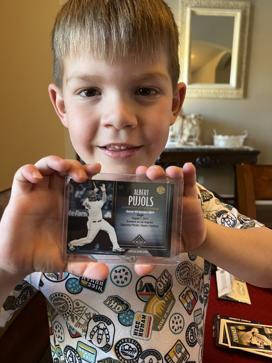 Mstate2004's tweet photo. I keep cheap packs in a drawer for my kids to open when they do something good or just for fun. Middle son loves it. He pulled a 1/1 out of one of the packs. Nothing valuable but he was pumped and thatโs all that mattered. #hobbywin https://t.co/yjBr6xjjJ8