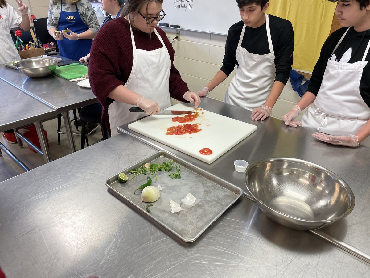 Sjohnston323's tweet photo. Knife skills in world foods! These kids are happy to be cooking! #GoLiberators #BHSFCS https://t.co/9O6rR3y1YX