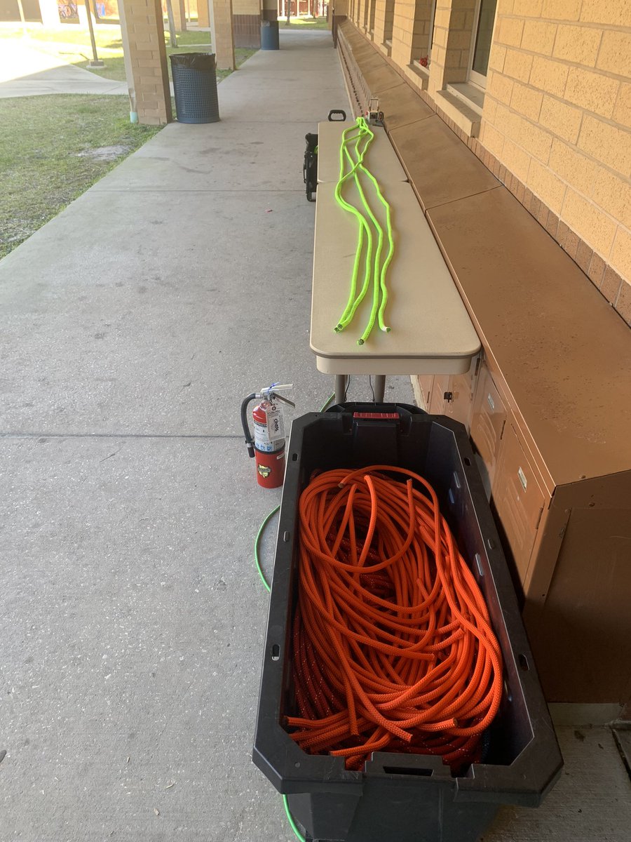 Cutting the rope in preparation for the students to tie knots in class. Thank you again CMC Pro for the donation. The rope shorts will go to good use.