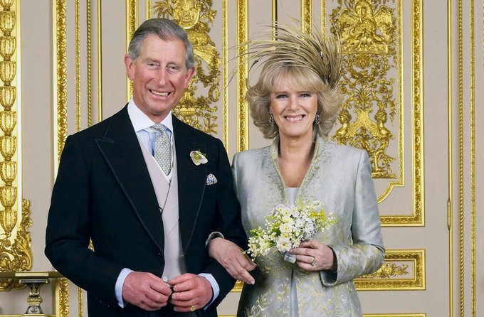 Clarence House official handout photo of the Prince of Wales and his new bride Camilla, Duchess of Cornwall in the White Drawing Room at Windsor Castle after their wedding ceremony, April 9, 2005 in Windsor, England. (Photo by Hugo Burnand/Pool/Getty Images)