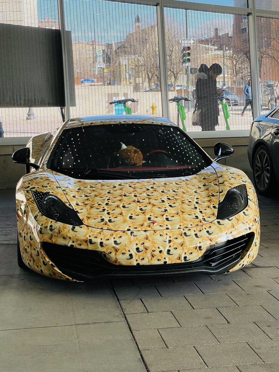 BoredOasis's tweet photo. Spotted a doge maxi car at the entrance of ETH Denver @EthereumDenver https://t.co/Buuzi4Ppdm