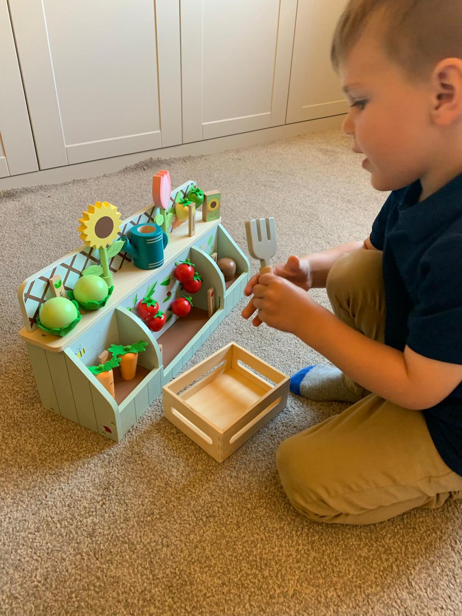Our child tester couldn't wait to 'harvest' the veg from this Growing Garden Wooden Toy from the Great Little Trading Co. Really like the tomatoes on their Velcro vine... <a href="/Gltco/">GreatLittleTradingCo</a> #parenting #toys