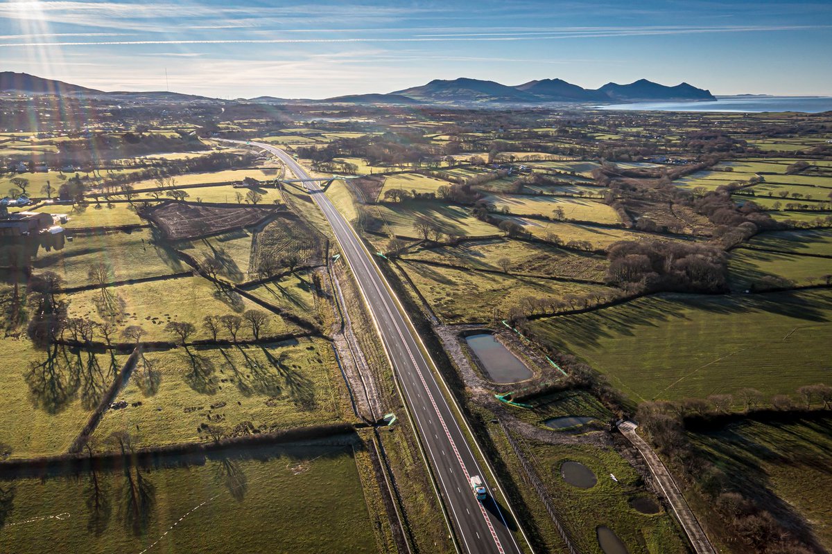 WGTransport's tweet photo. The A487 Caernarfon and Bontnewydd bypass will open to traffic on Friday morning, 18 February.

The road has been completed ahead of time, with work continuing safely throughout the pandemic. @TrafficWalesN https://t.co/sJHNmSIegU