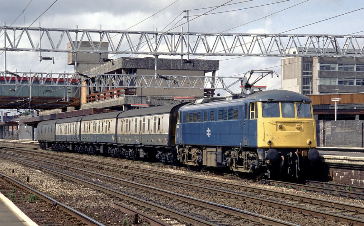 N_Amberfield's tweet photo. Class 85/1 no. 85110 (renumbered from 85036) calls at Stafford with vans for London Euston, August 1989 #ElectricTuesday
📸 Chris Morrison https://t.co/XI9voh4xjv