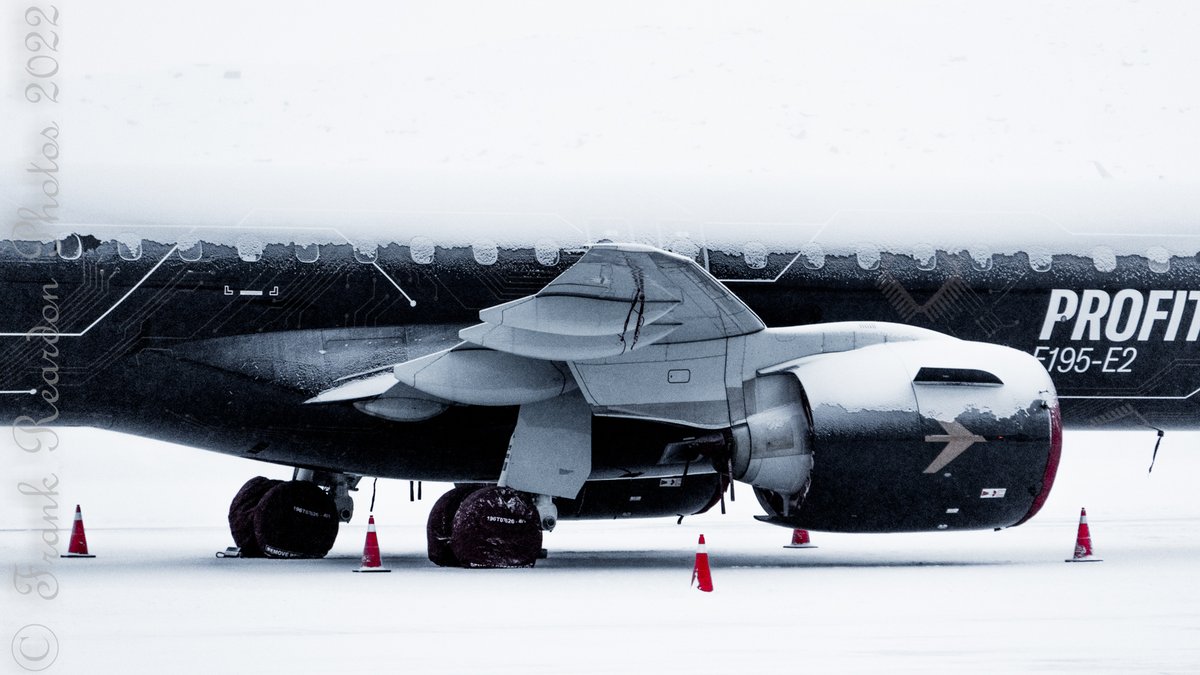 FrankReardon1's tweet photo. The @Embraer E195-E2 #PRZIQ parked at the #FBO in #Iqaluit #Nunavut covered in snow conducting cold weather testing on the “Profit Hunter” Livery FEB.14.2022 #YFBSpotters #E195E2 #AVGEEK https://t.co/OWosXdQVQL