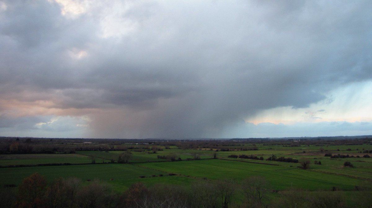 Monk_Po's tweet photo. @Phil_M_Barrett Views of, and then from the Mump. 
Summertime photos are to the SE and NE (up to Glastonbury), Wintertime shot is NW. 
(Implied Oak King / Holly King references in the timing are accidental, but ... 😉) https://t.co/tTuUmIRB0A