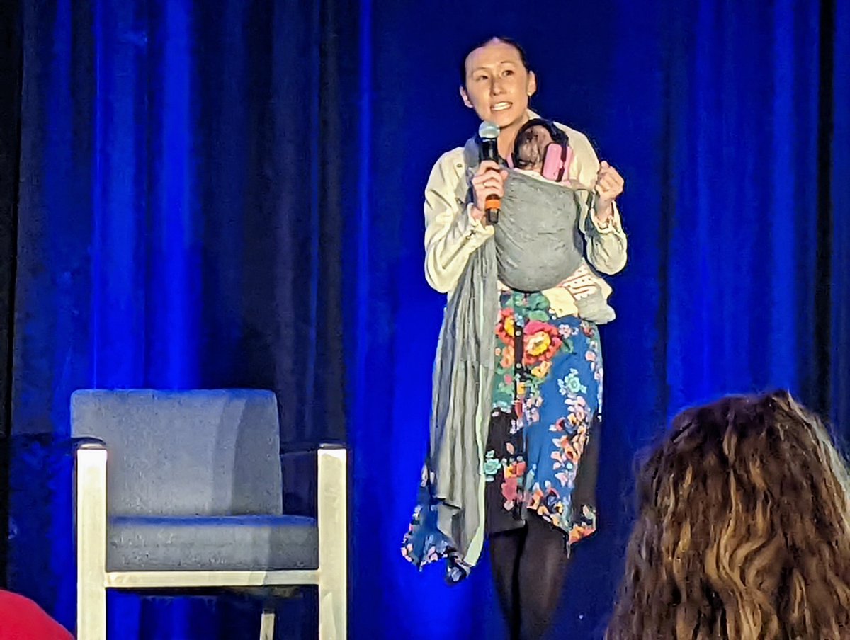 Can we normalize this? @MsMagiera introduces our keynote speaker at #IDEAcon and has her baby with her. Let parents (especially moms) bring their kids with them when they need to. Why should they have to choose between leaving them behind or going to work (or someplace else)?